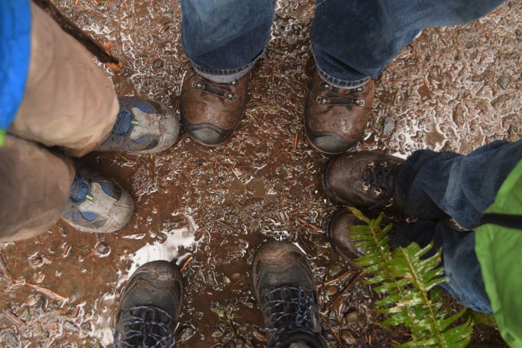 Muddy boots hiking at Silver Falls, Oregon