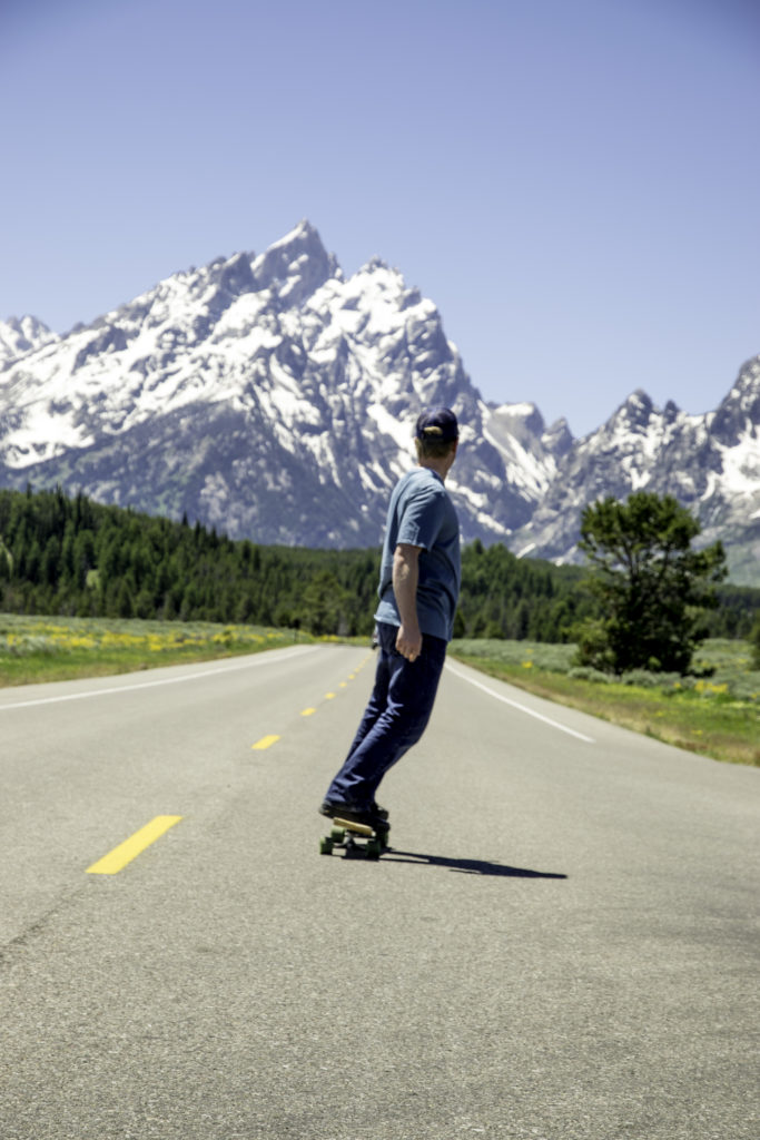 Riding a skateboard in Grand Teton National Park
