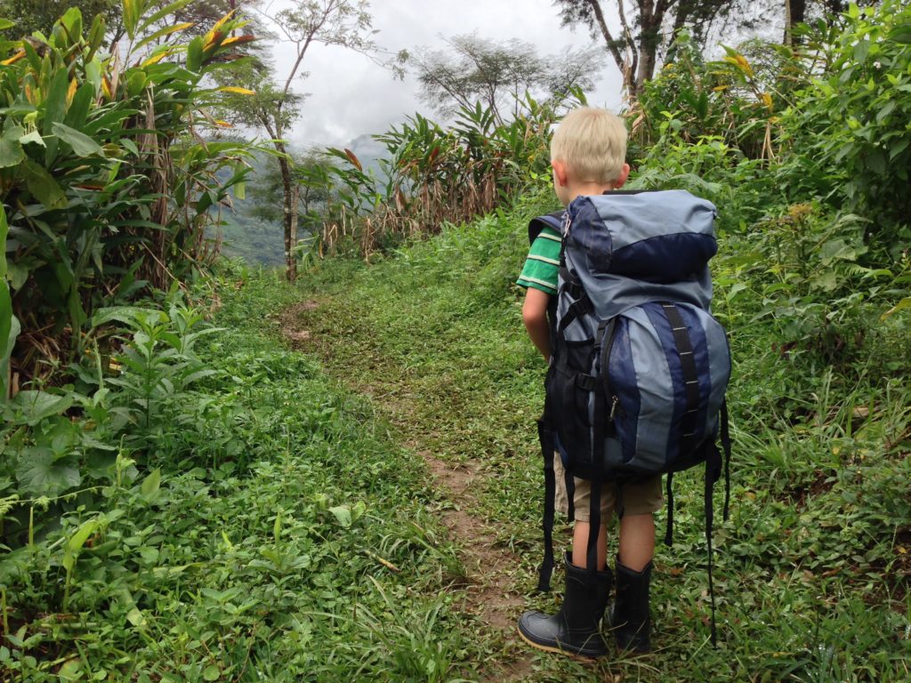 Kid hiking in the jungles of Guatemala