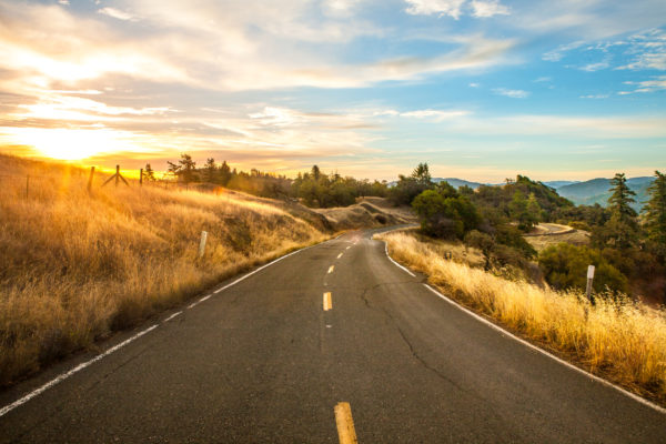 Driving down the road during sunset in Northern California