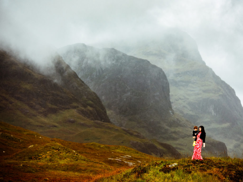 Woman and child in Glencoe, Scotland mountains