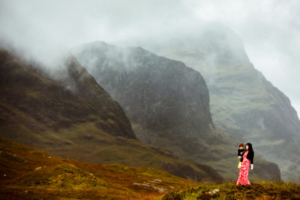 Woman and child in Glencoe, Scotland mountains