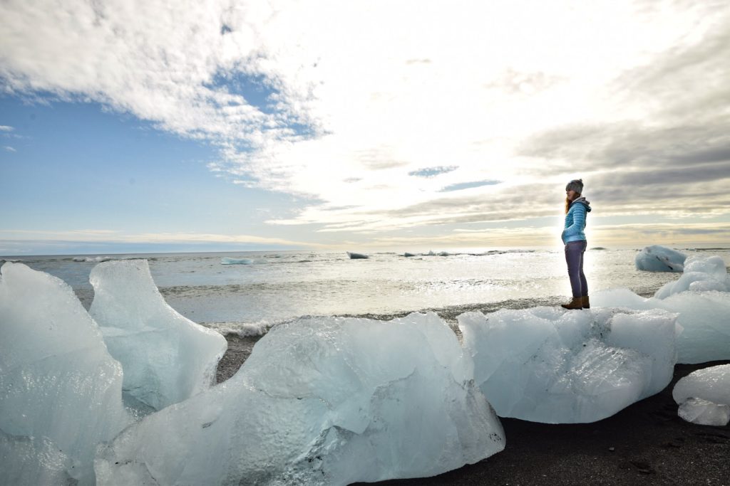 Standing on top of ice at Diamond Beach, Iceland