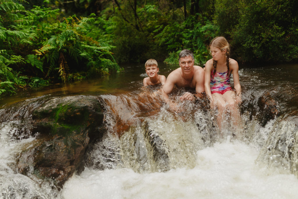 Soaking in the hot springs of Kerosine Creek New Zealand