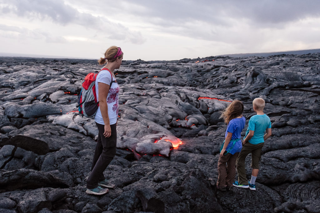 Family looking at lava at Hawaii Volcanoes National Park