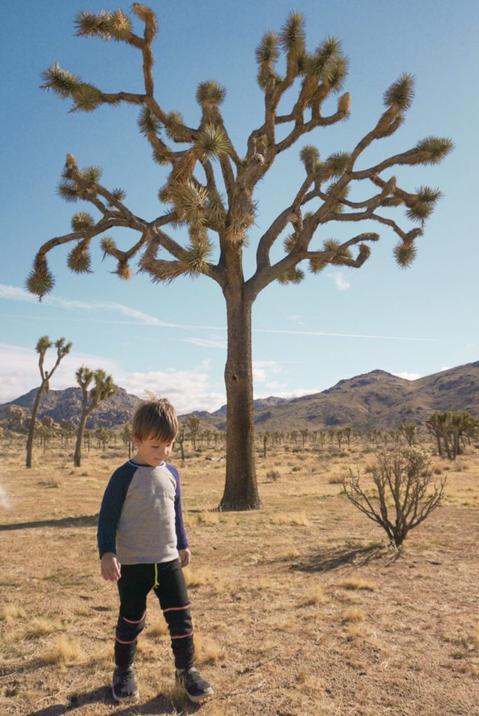 Kid running free at Joshua Tree National Park, California