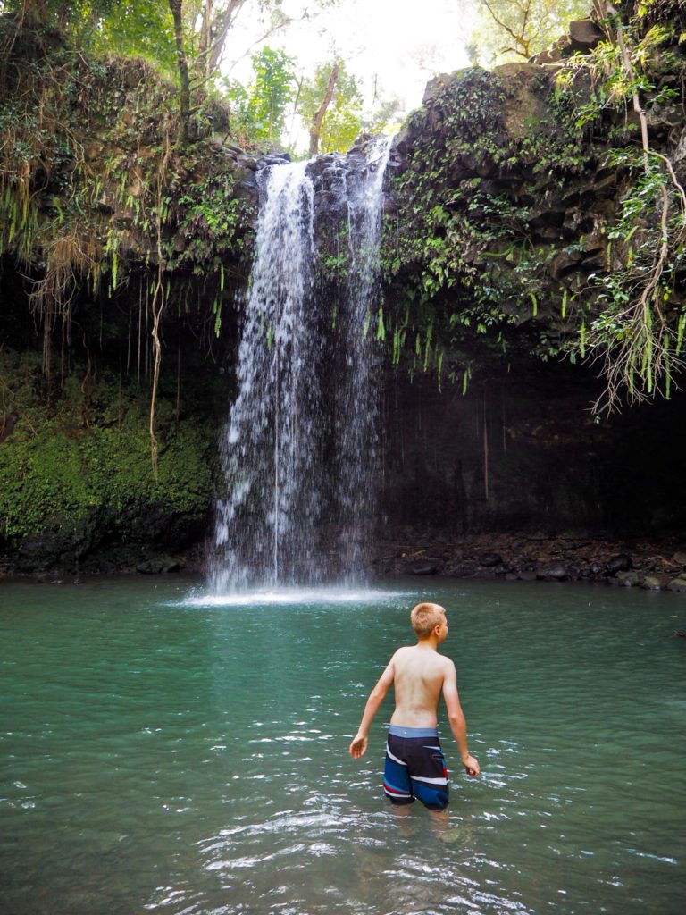 Kid swimming in Twin Falls, Road to Hana, Maui