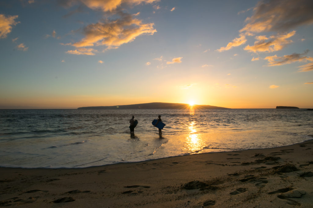 Boogie boarding at sunset at Big Beach, Makena State Park.