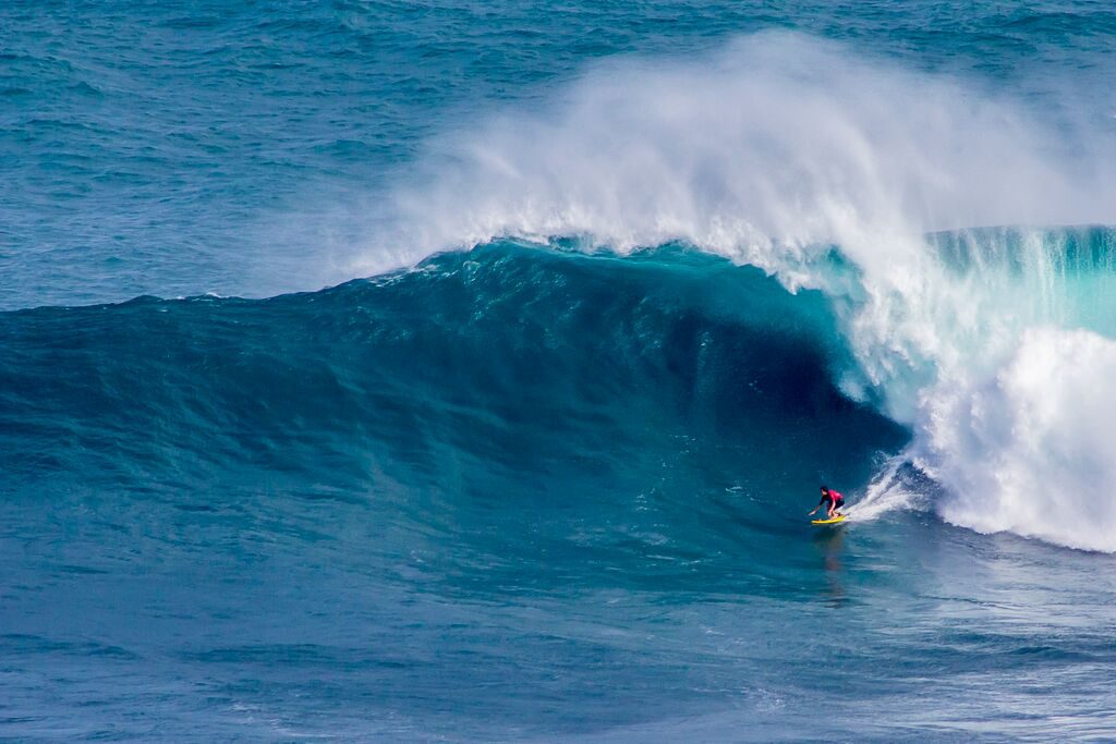 Surfer on Jaws in Pe'ahi Beach, Maui