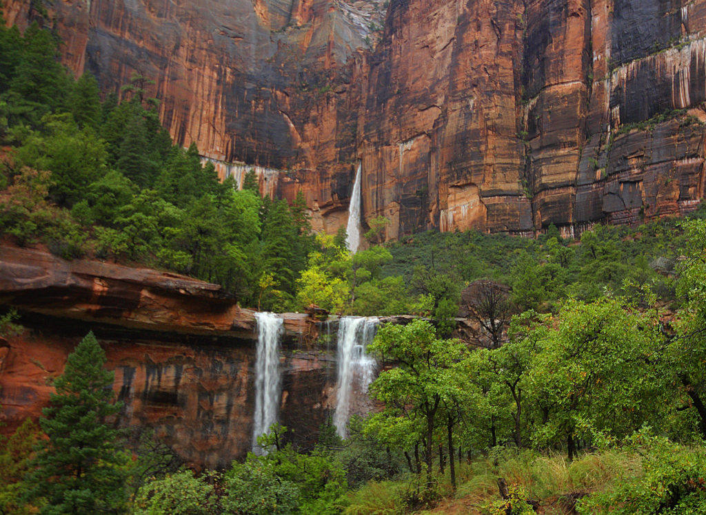 Three waterfalls are produced during a heavy rain at The Emerald Pools at Zion National Park