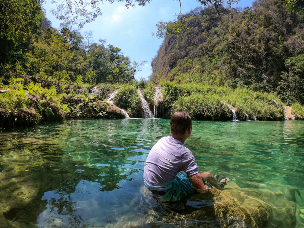 Kid relaxing at the pools of Semuc Champey