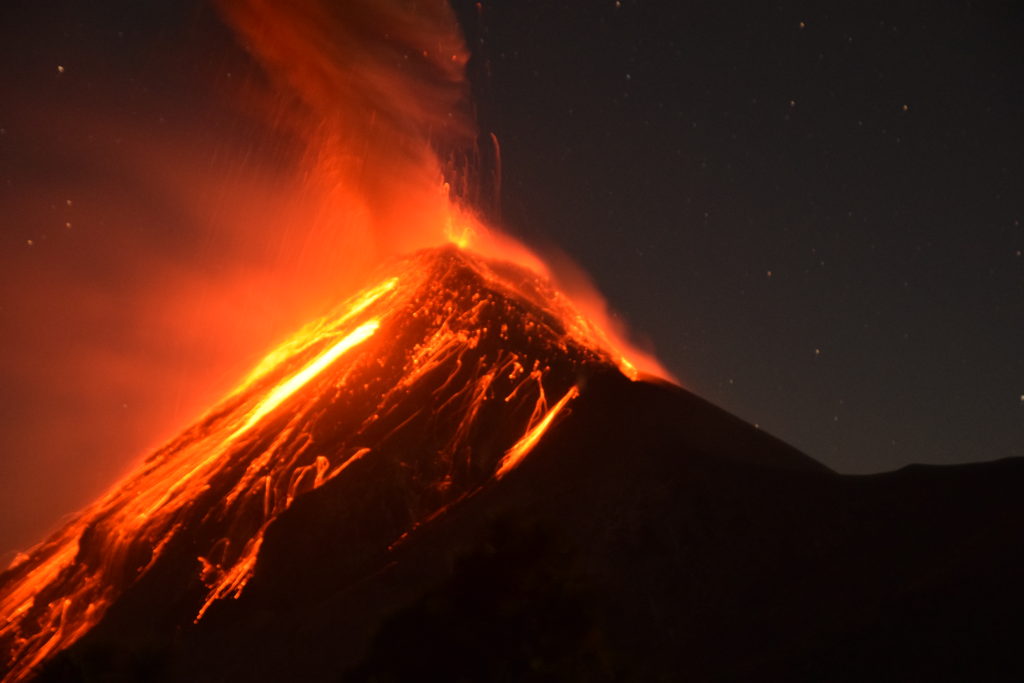 Volcano Fuego erupting at night from basecamp on Acatenango, Guatemala