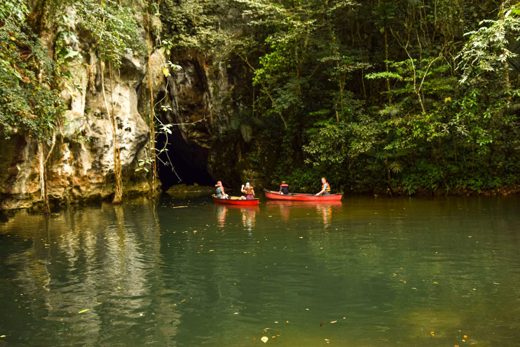 Family canoeing at Barton Creek, San Ignacio, Belize