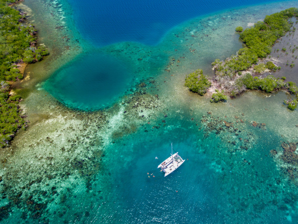 A catamaran aerial view over Belize reef