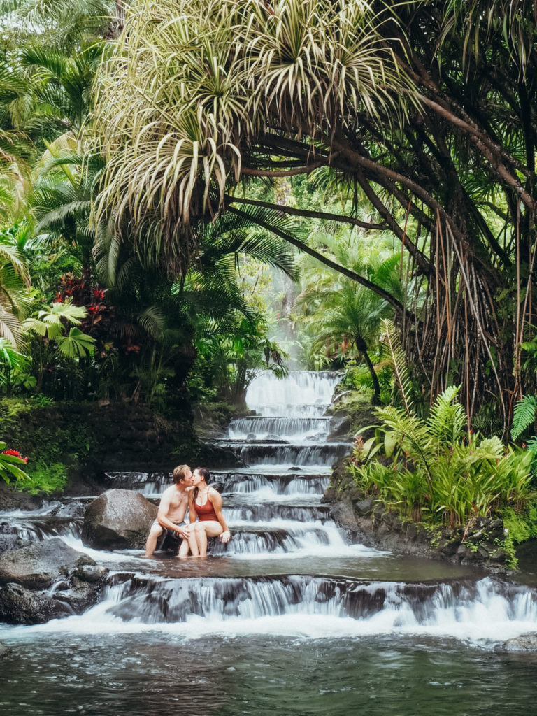 Couple kissing in Tabacon hot springs, Arenal, La Fortuna, Costa Rica