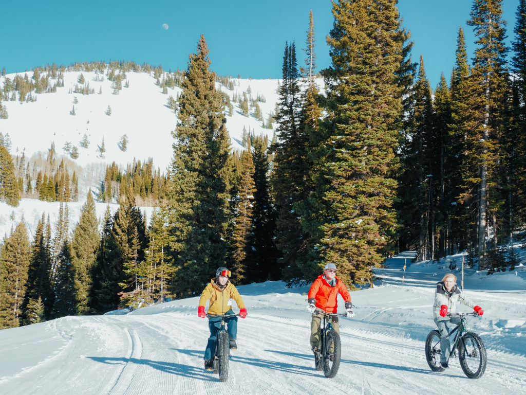 Family fat biking on trails at Grand Targhee Ski Resort, Wyoming