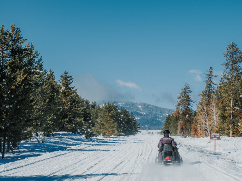 Snowmobiling in Island Park, Idaho in winter